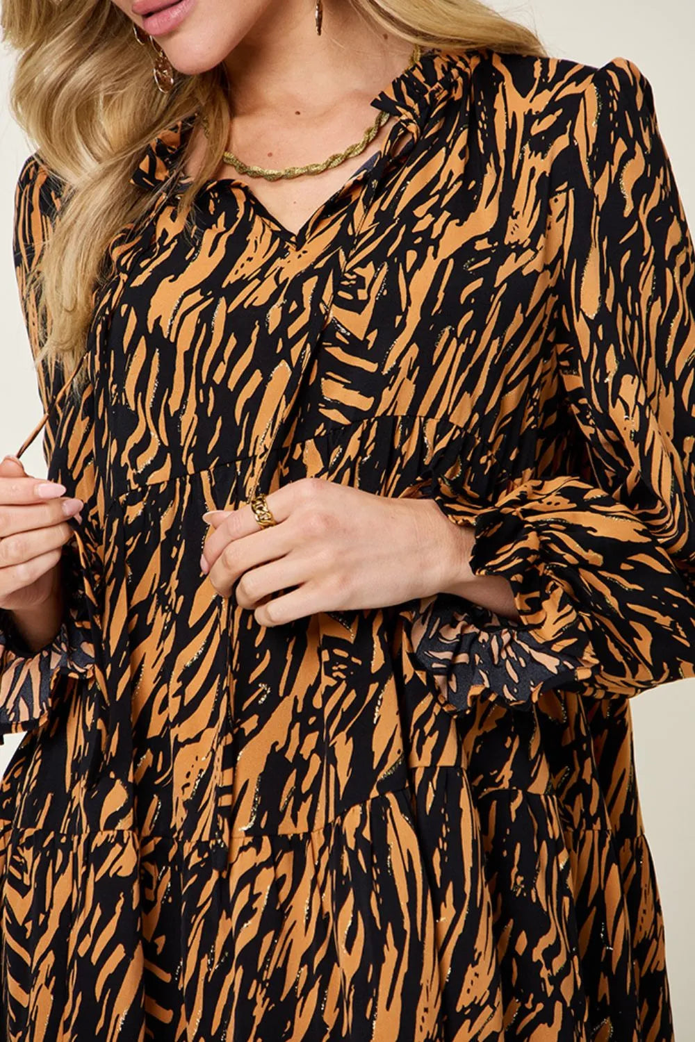 Caramel and black printed dress bodice with V-neck and long puff sleeves