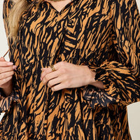 Caramel and black printed dress bodice with V-neck and long puff sleeves