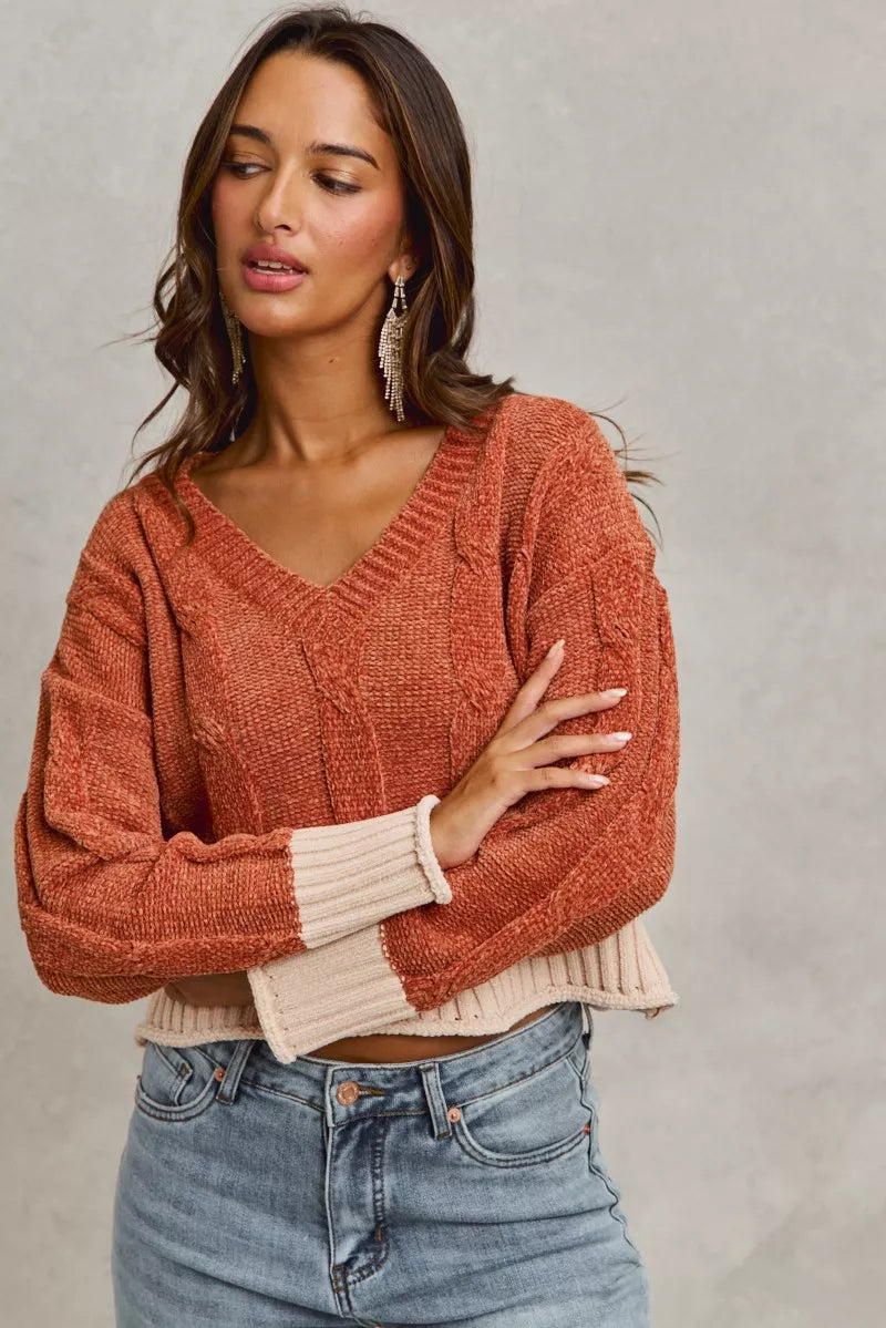 Rust chenille V-neck sweater with cream ribbed cuffs and contrast hem band