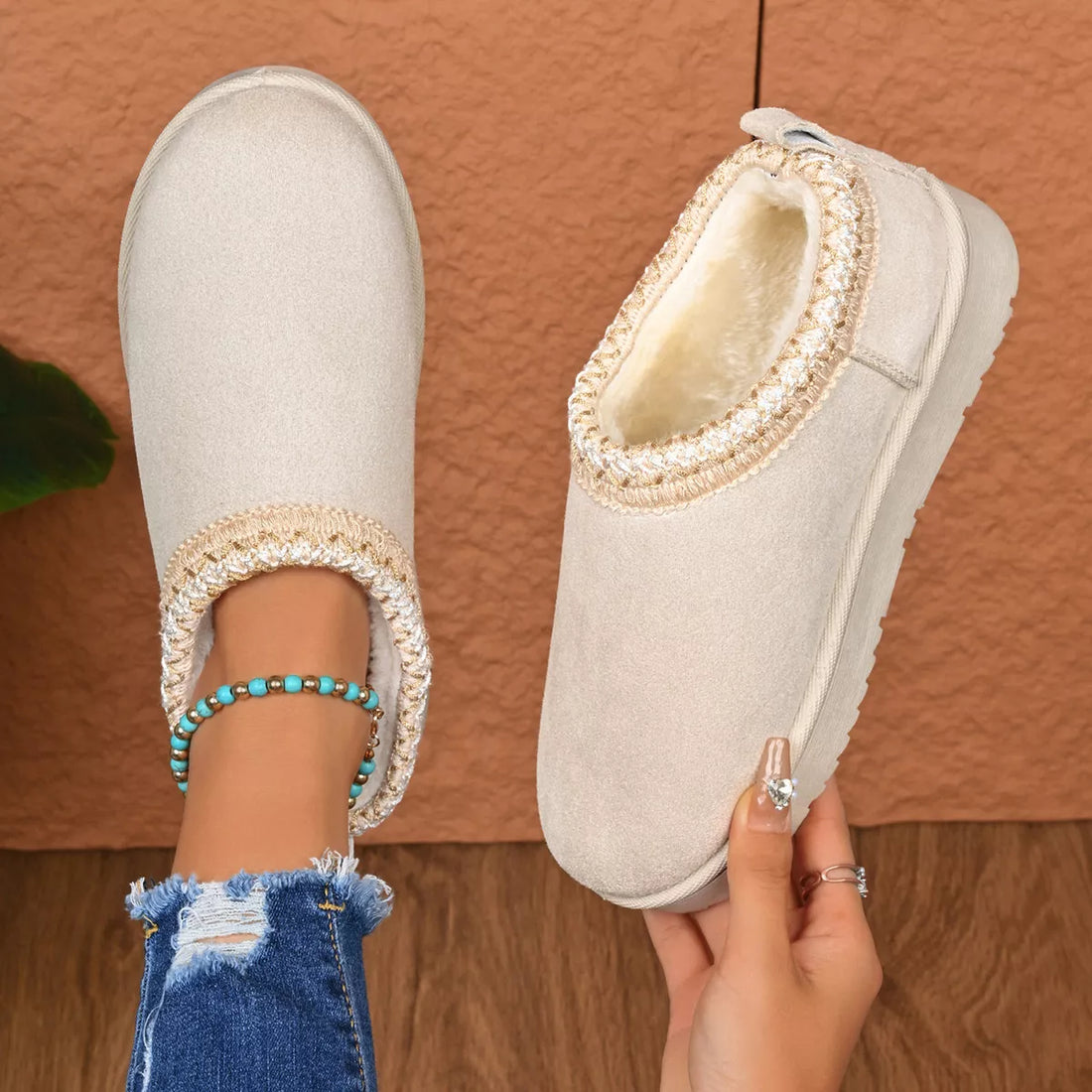 White round-toe platform ankle boots with beaded trim and stitched collar