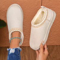 White round-toe platform ankle boots with beaded trim and stitched collar