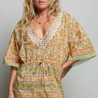 Coral floral V-neck blouse with tie waist, loose kimono sleeves, striped borders