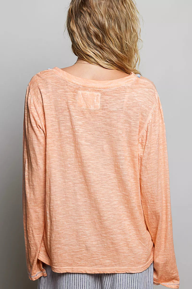 Peach lightweight knit top back view with long sleeves