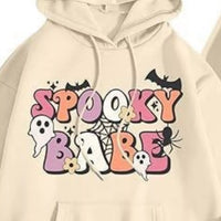 Plus-size Halloween graphic hoodie in pastel yellow with cute cartoon front Spooky Baby design