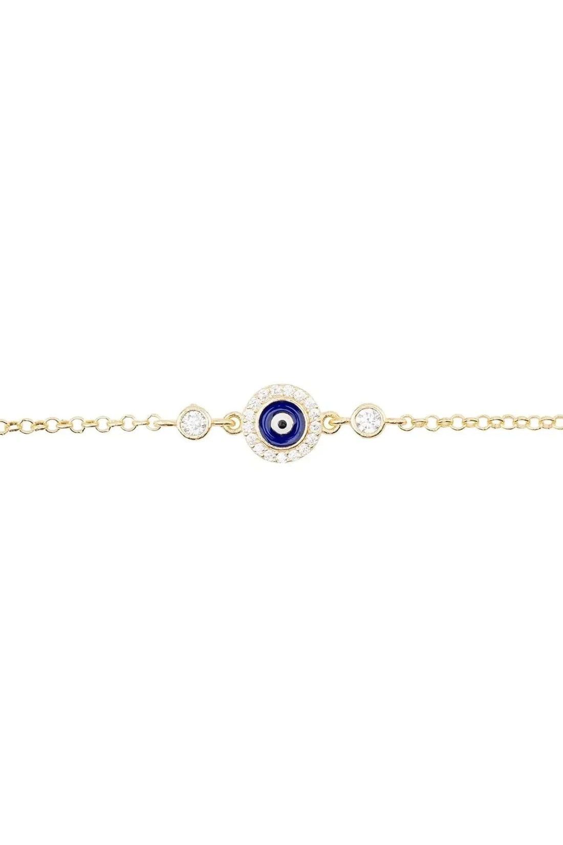Gold evil-eye bracelet close-up with dark blue enamel eye and tiny clear beads