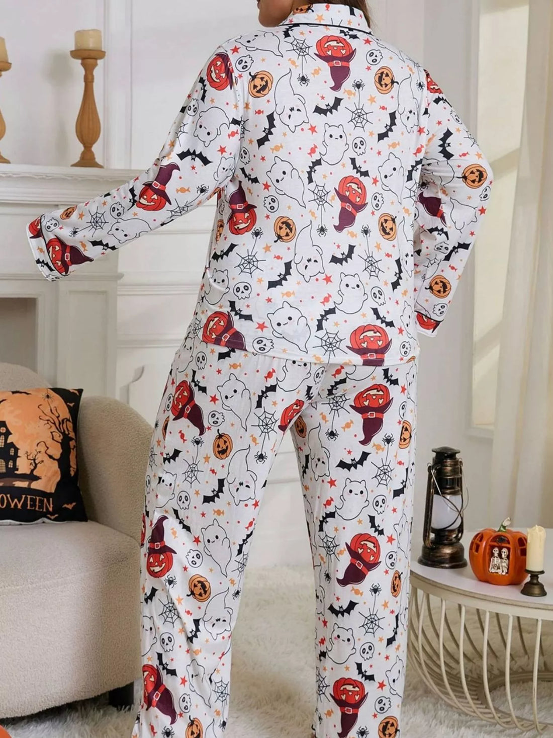 Plus size Halloween pajama set, white long-sleeve top and matching pants with allover print