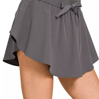 Ash grey woven active skort, elastic waist with draped skirt and bow tie