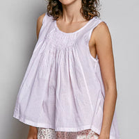Lavender sleeveless cotton top with round neck and gathered pleated yoke