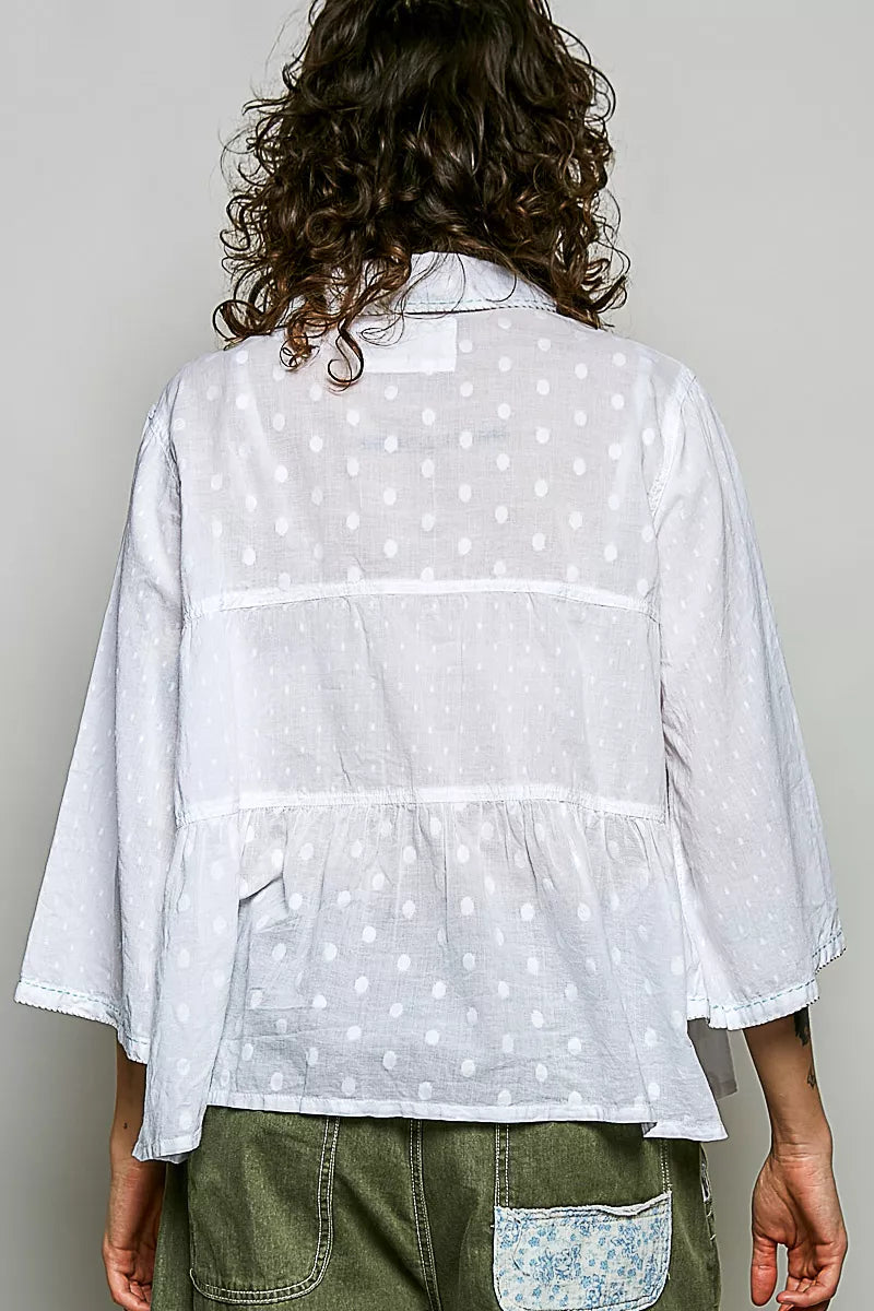 Off-white button-front shirt with tonal dot pattern, back view