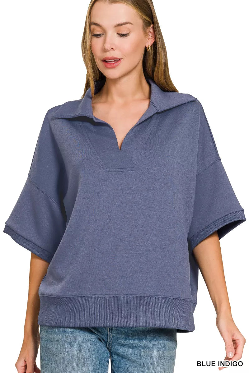 Blue indigo scuba collared short-sleeve pullover with V neckline placket, relaxed fit