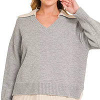 Grey V-neck sweater with contrasting beige back-collar and ribbed hem, long sleeves