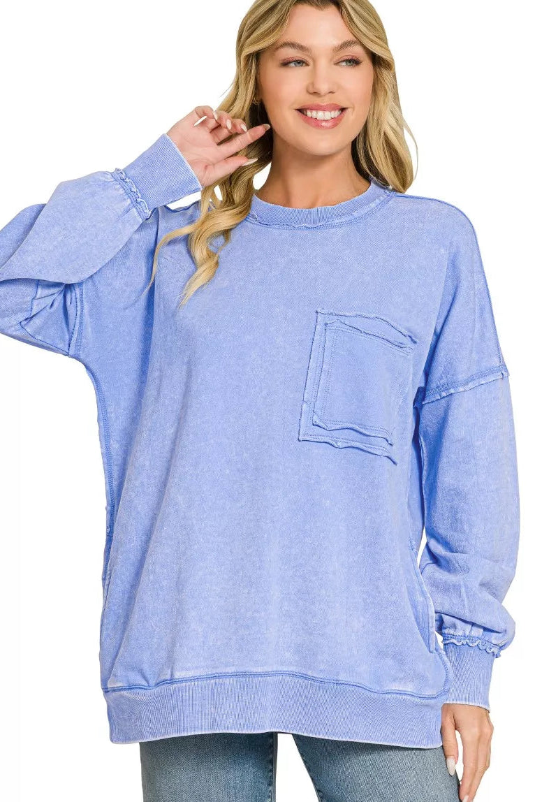 Women’s acid-wash French terry sweatshirt in cornflower blue, raw-edge cuffs, front pocket