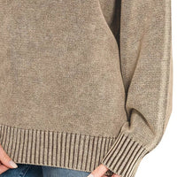 Brown washed knit sweater with ribbed cuffs and hem detail on long sleeve