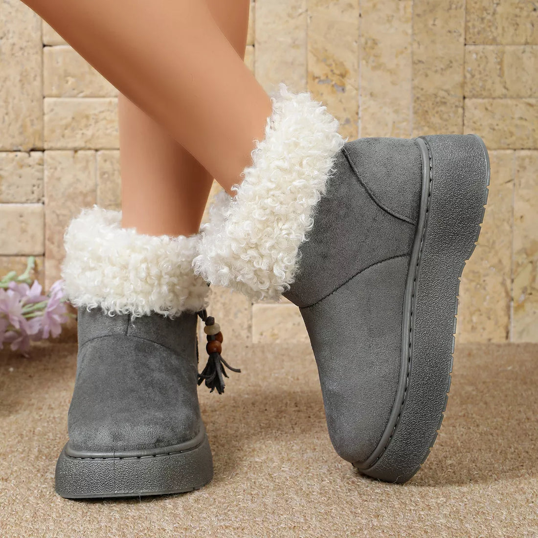 Gray suede round-toe boots with faux fur lining and cuff, side tassel charm
