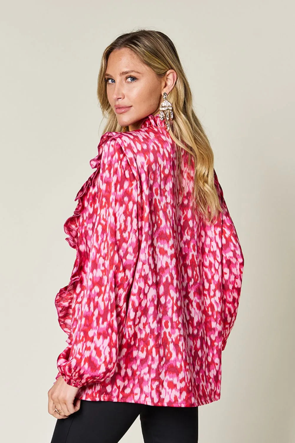 Hot pink printed plus size blouse, back view with gathered ruffle-trim sleeves