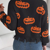 Black V-neck sweater with orange pumpkin pattern, distressed frayed hem on back view