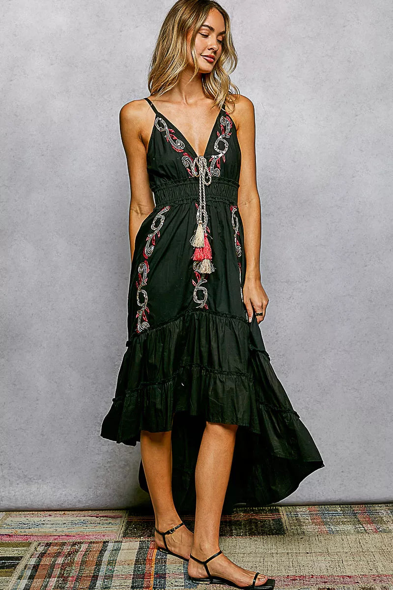 Black cami midi dress with embroidered motifs and tassel tie, smocked waist tiers