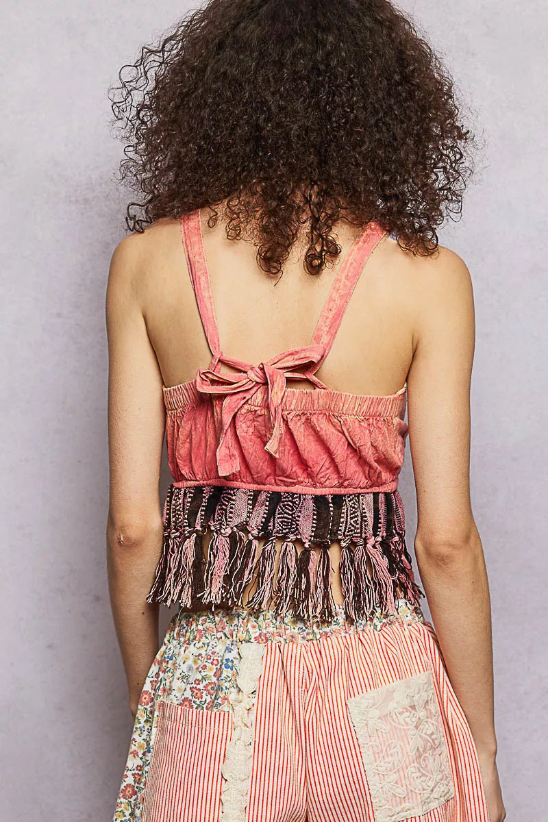 Back view of pink lace tank top with crisscross tie straps