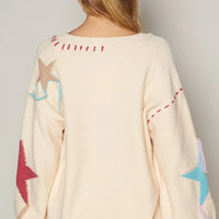 Back view pale beige V-neck long-sleeve sweater with star prints and trim