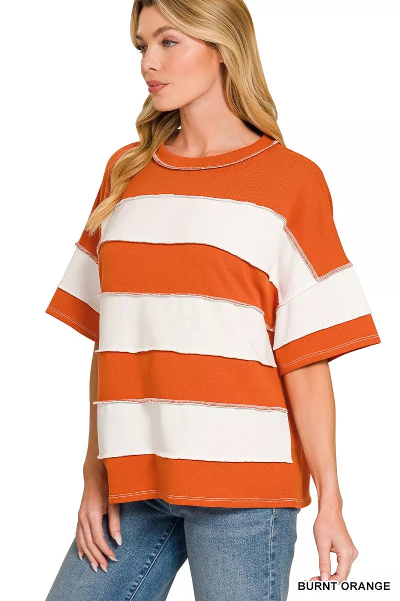 Burnt orange and white striped terry top with crew neck and short sleeves