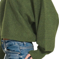 Dark olive sweater sleeve with balloon shape and ribbed cuff detail