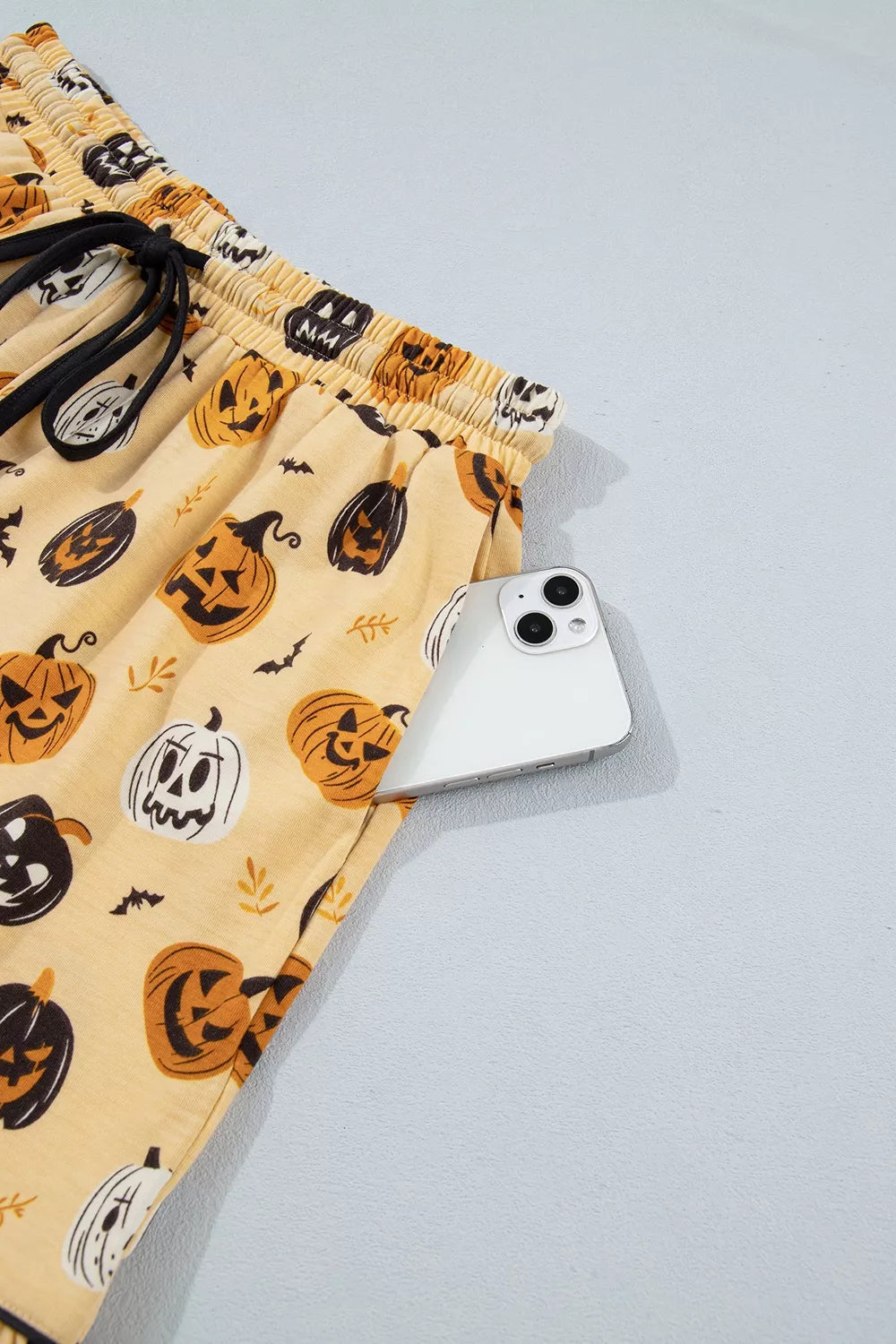 Gold Halloween pumpkin print lounge shorts, elastic waist with side ruffle detail