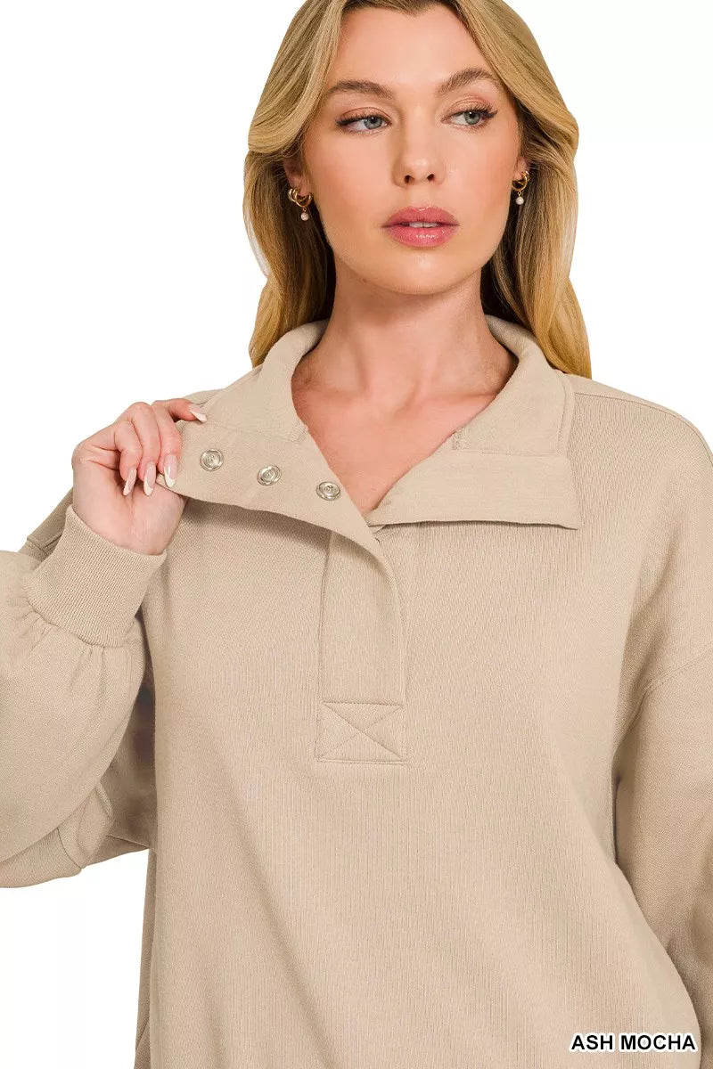Fleece half-snap sweatshirt in ash mocha with buttoned placket and collared neckline