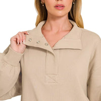 Fleece half-snap sweatshirt in ash mocha with buttoned placket and collared neckline