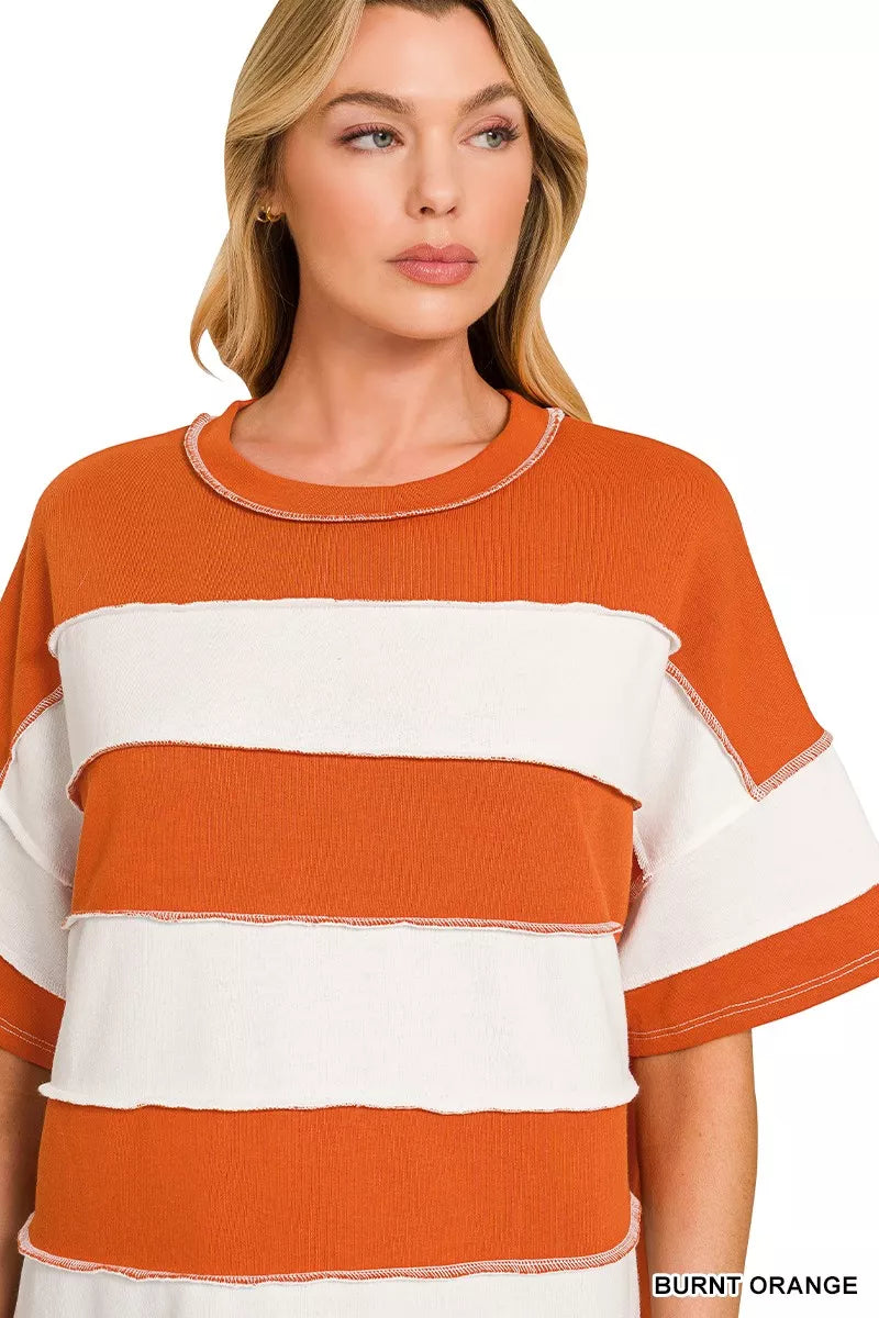 Burnt orange and white striped terry top with crew neck and contrast trim