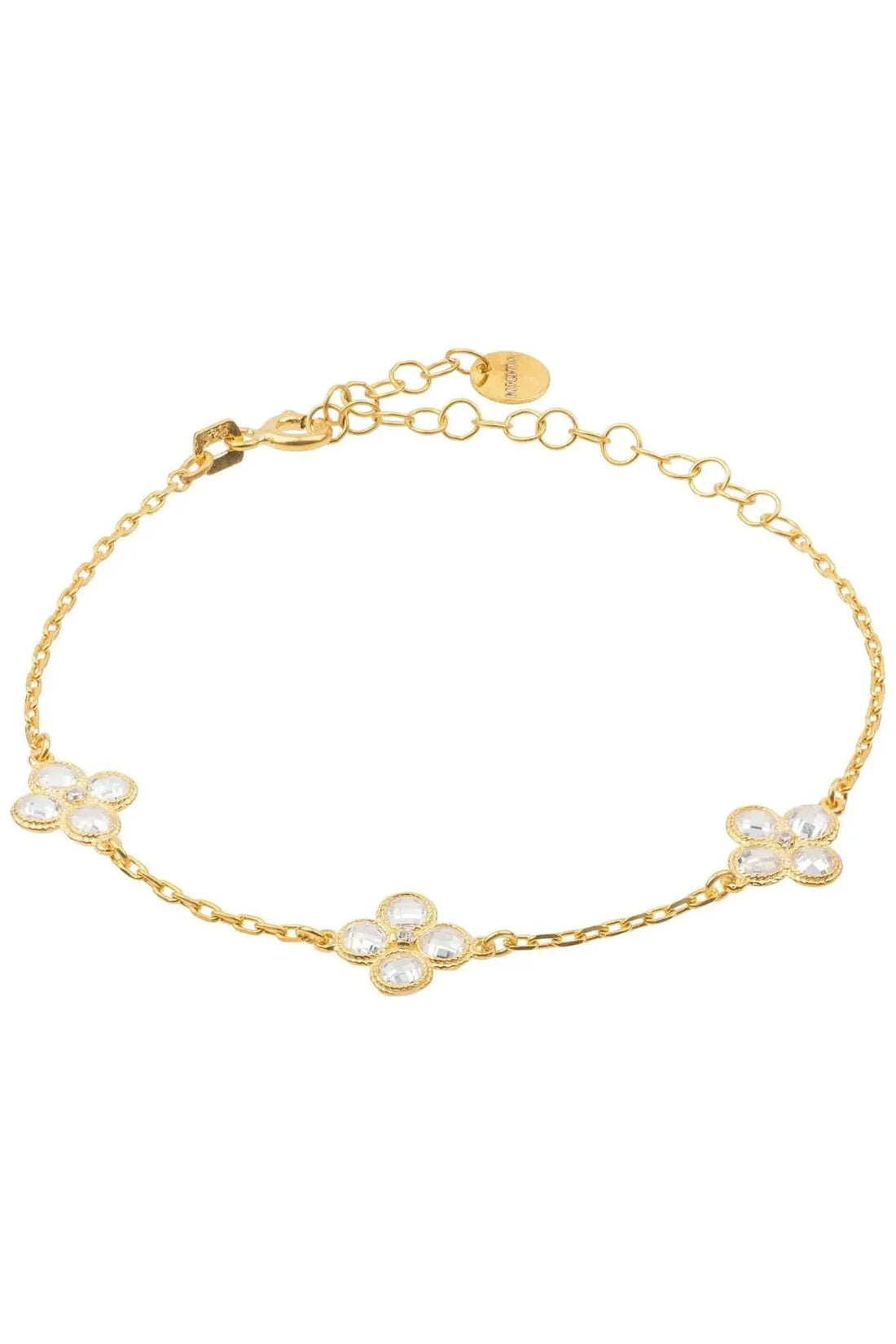Gold bracelet with three clover charms and clear crystal stones on a link chain