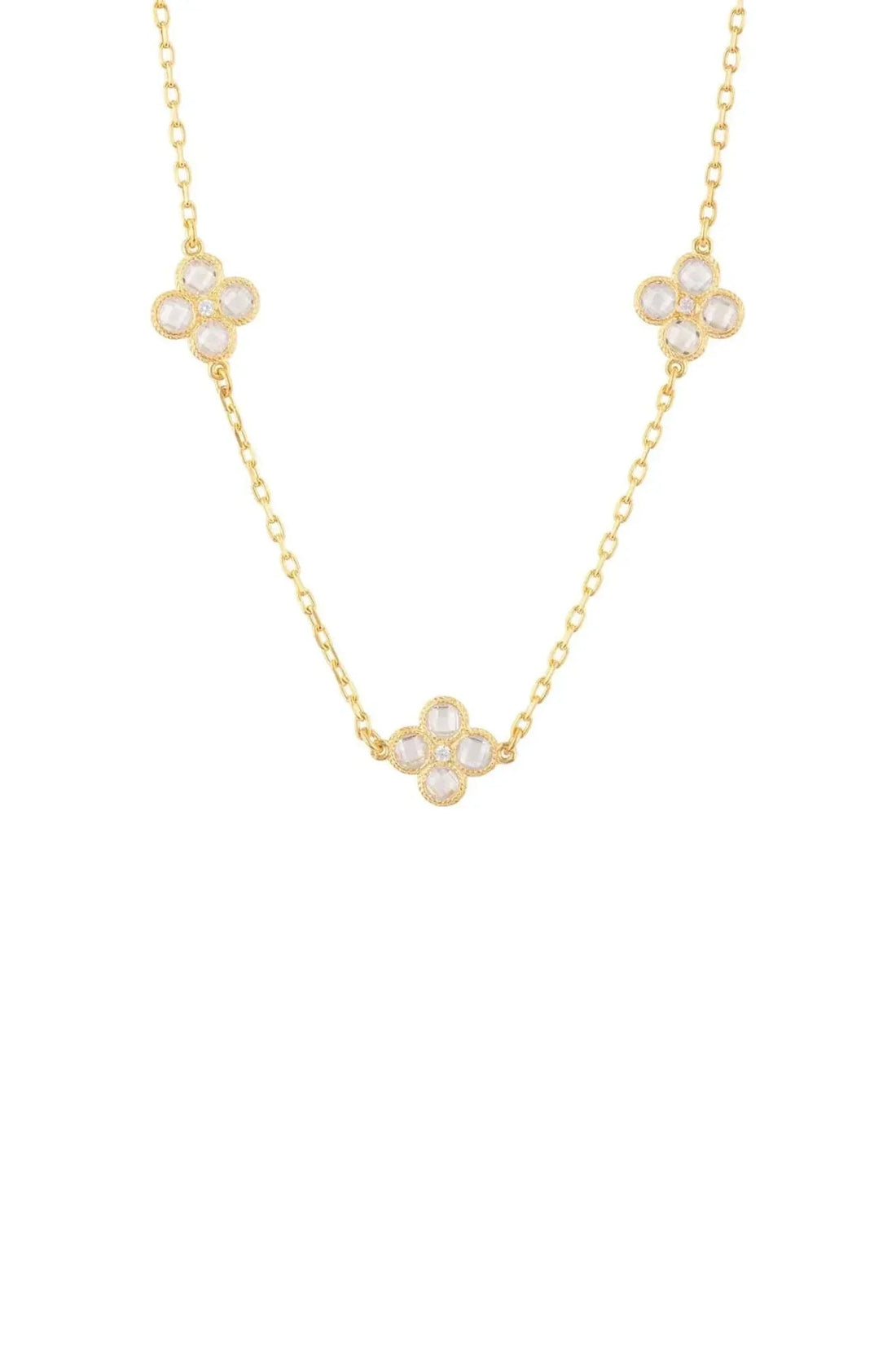 Gold triple choker necklace with clover flower charms and crystal centers