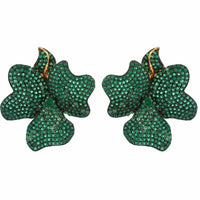Gold flower stud earrings with emerald green stones