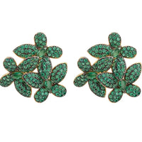 Large flower stud earrings with emerald-green crystal petals and gold-tone posts