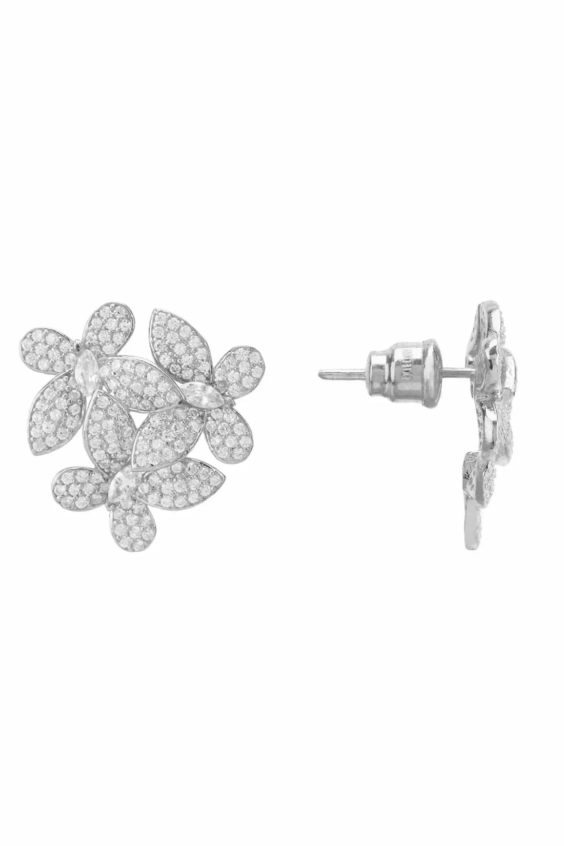 Silver flower stud earrings with butterfly backs, side view