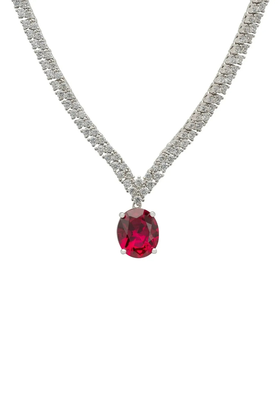 Silver tennis necklace with oval ruby gemstone drop on a rhinestone chain
