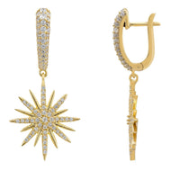 Gold starburst drop earrings with crystal sunburst charms and secure hoop clasps