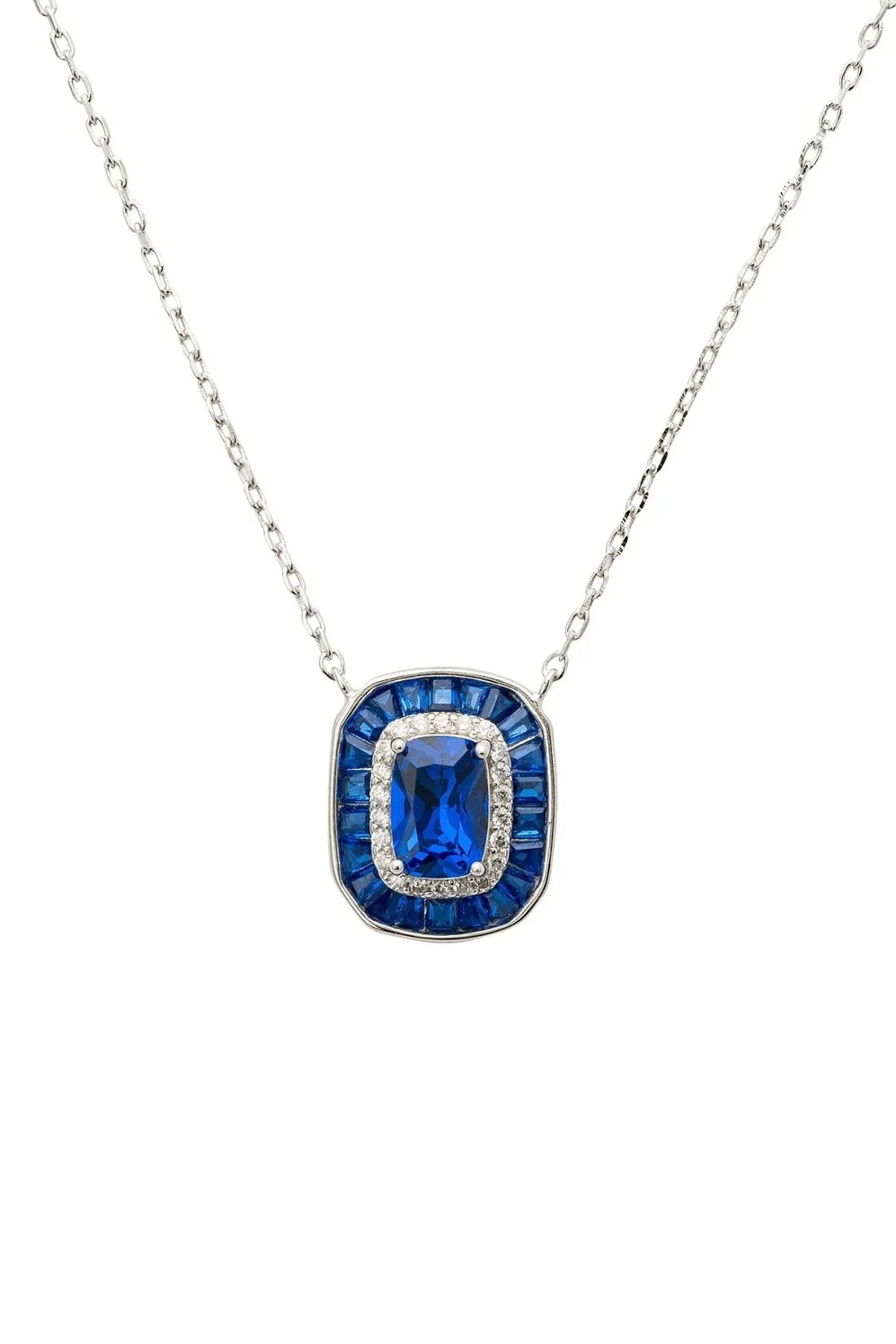 Silver sapphire pendant necklace with square blue stone bezel and halo accents