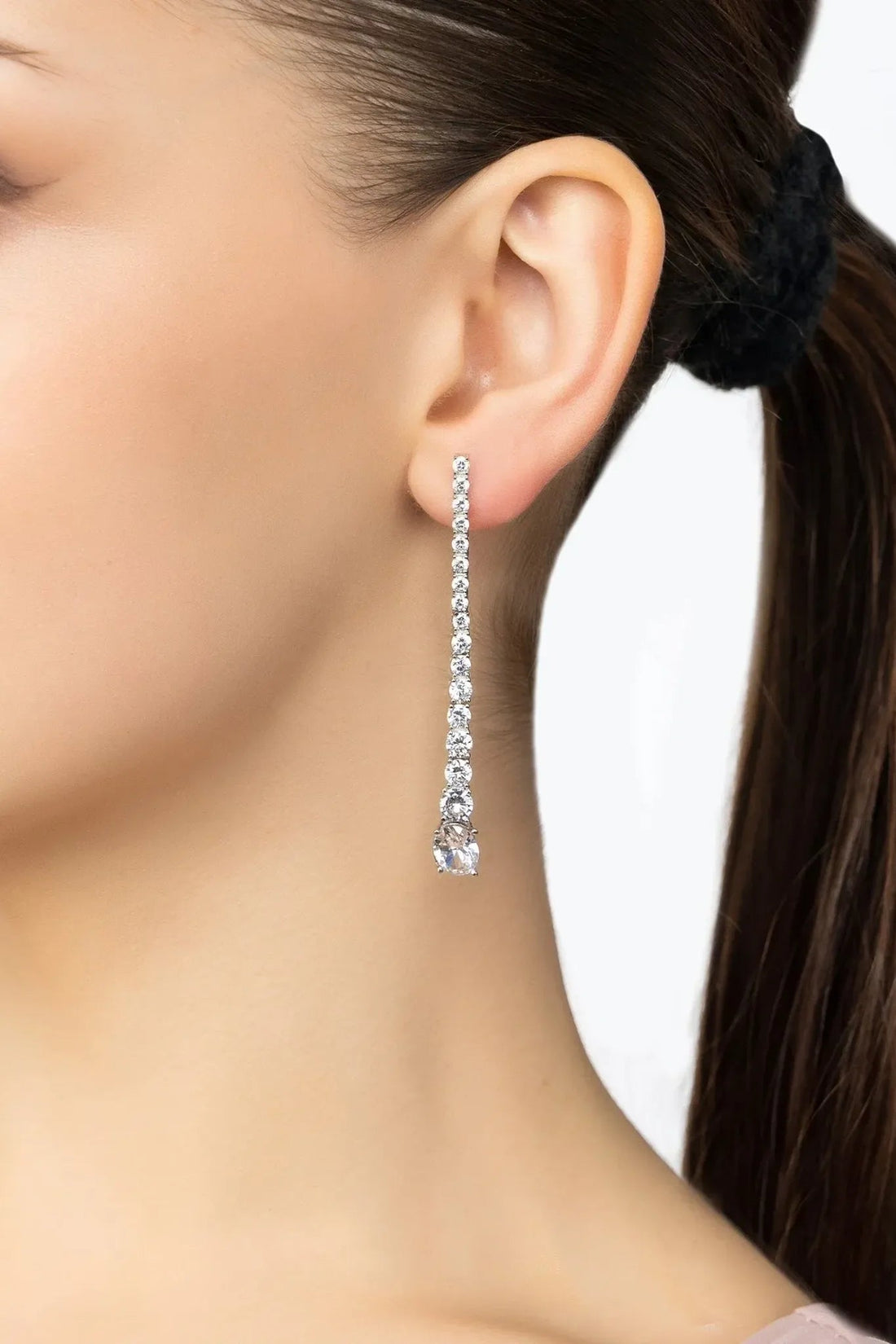 Silver crystal drop earrings with a long dangling chain