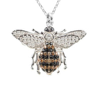 Silver honey bee pendant necklace with sparkling rhinestone wings and bee center
