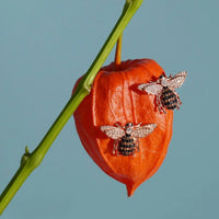 Gold honey bee stud earring with crystal wings and black enamel abdomen