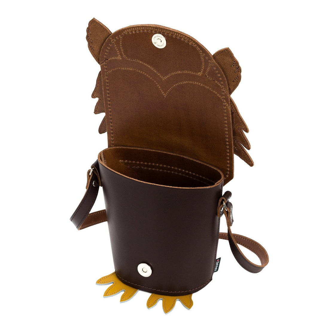Brown leather owl bag with front strap loops and stitched flap, button closure