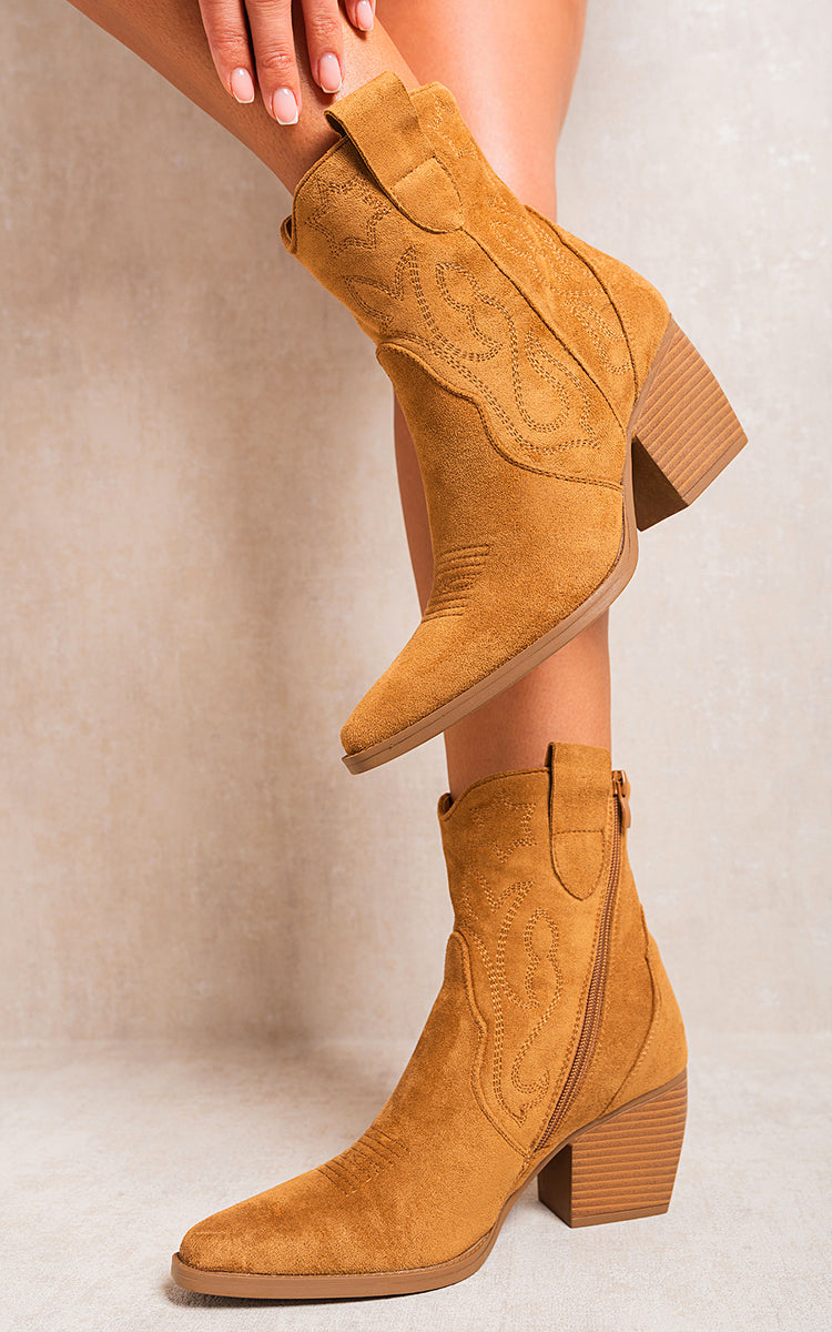 Camel ankle boots with western-inspired stitched panels and stacked wooden heel