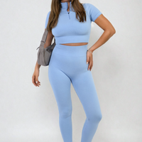 Light blue ribbed half-zip crop top and high-waist leggings set, front stance