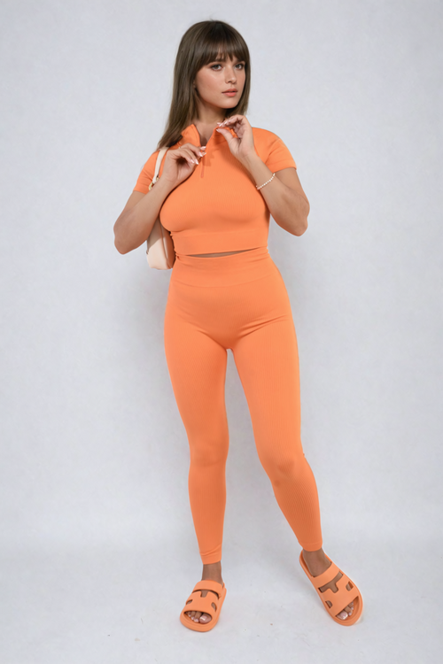 Orange ribbed half-zip crop top and high-waist leggings co-ord set