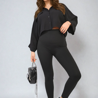 Black high-waisted leggings with fitted legs and smooth waistband, full-length front