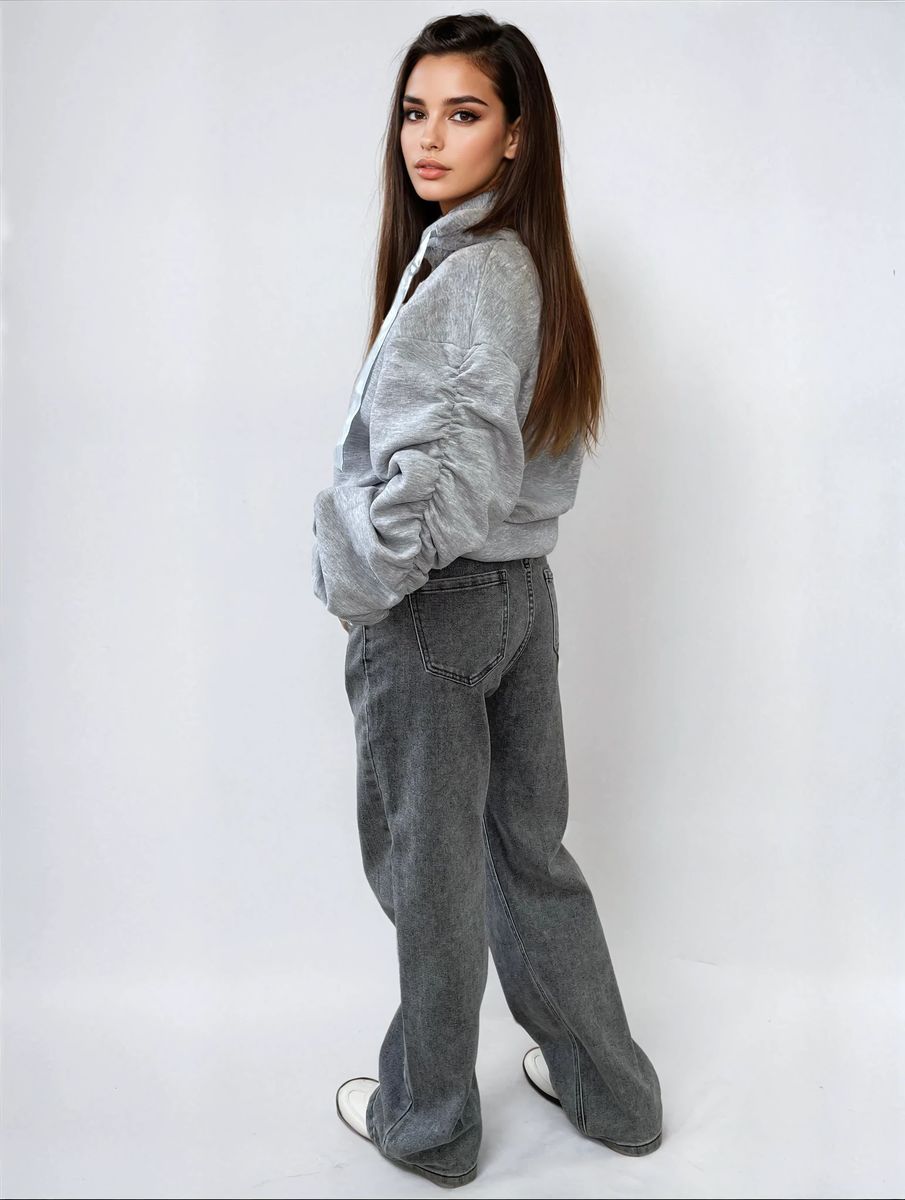 Oversized gray hoodie with ruched sleeves, pouch pocket, and drawstring hood