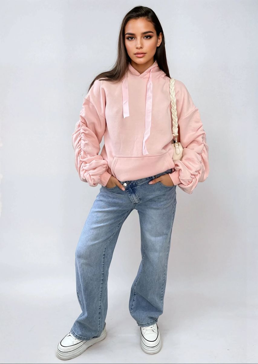 Oversized pink hoodie with ruched sleeves, pouch pocket, and drawstring hood
