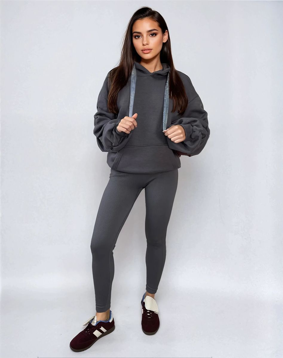 Dark gray oversized hoodie with drawstring hood and front pouch pocket, ruched sleeves