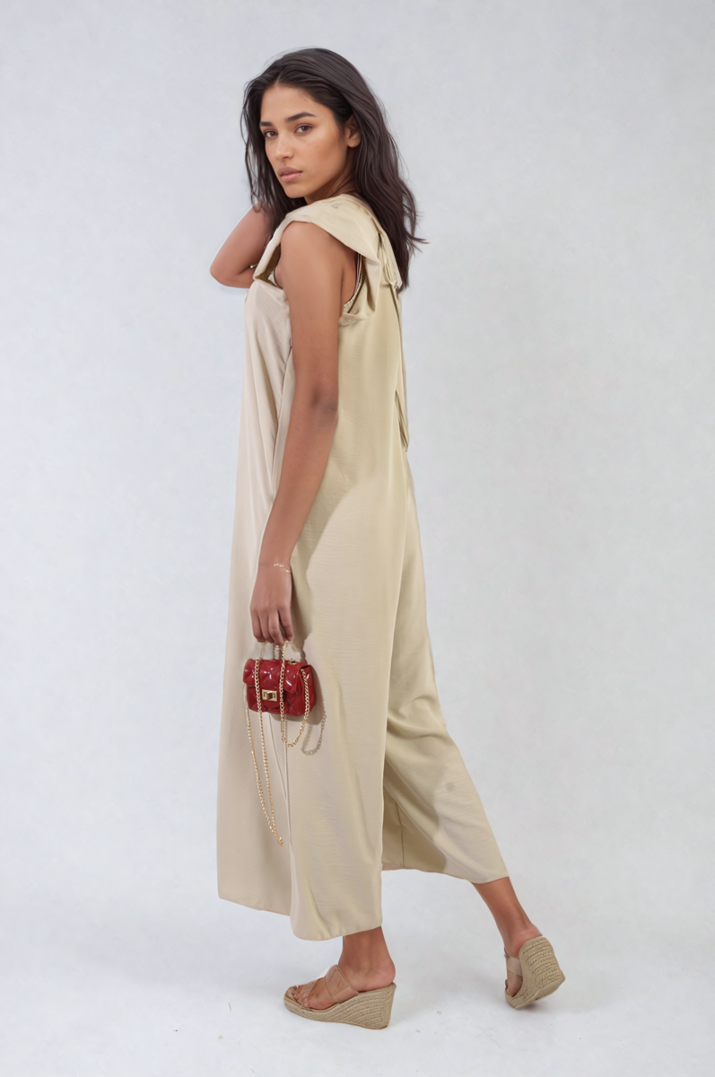 Sleeveless wide-leg jumpsuit in light beige/cream with V-neck