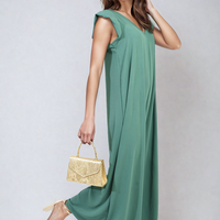 Green wide-leg jumpsuit with V-neck and ruffle sleeves, walking pose
